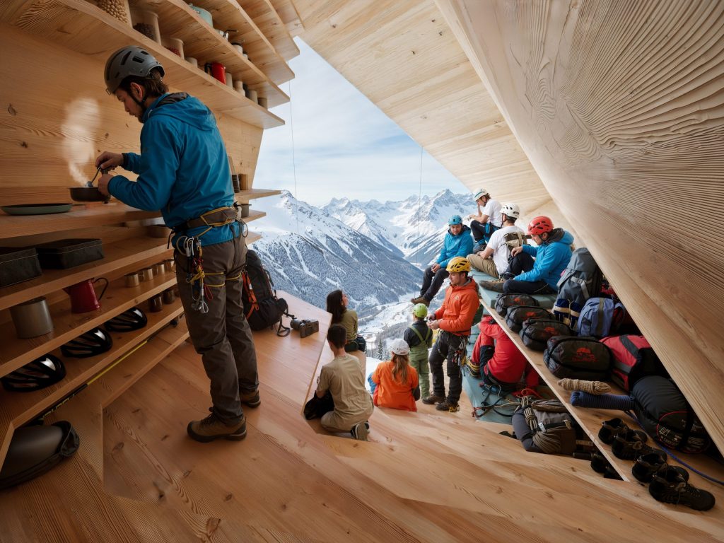 Interior of the self-sufficient bivouac showing compact living space.