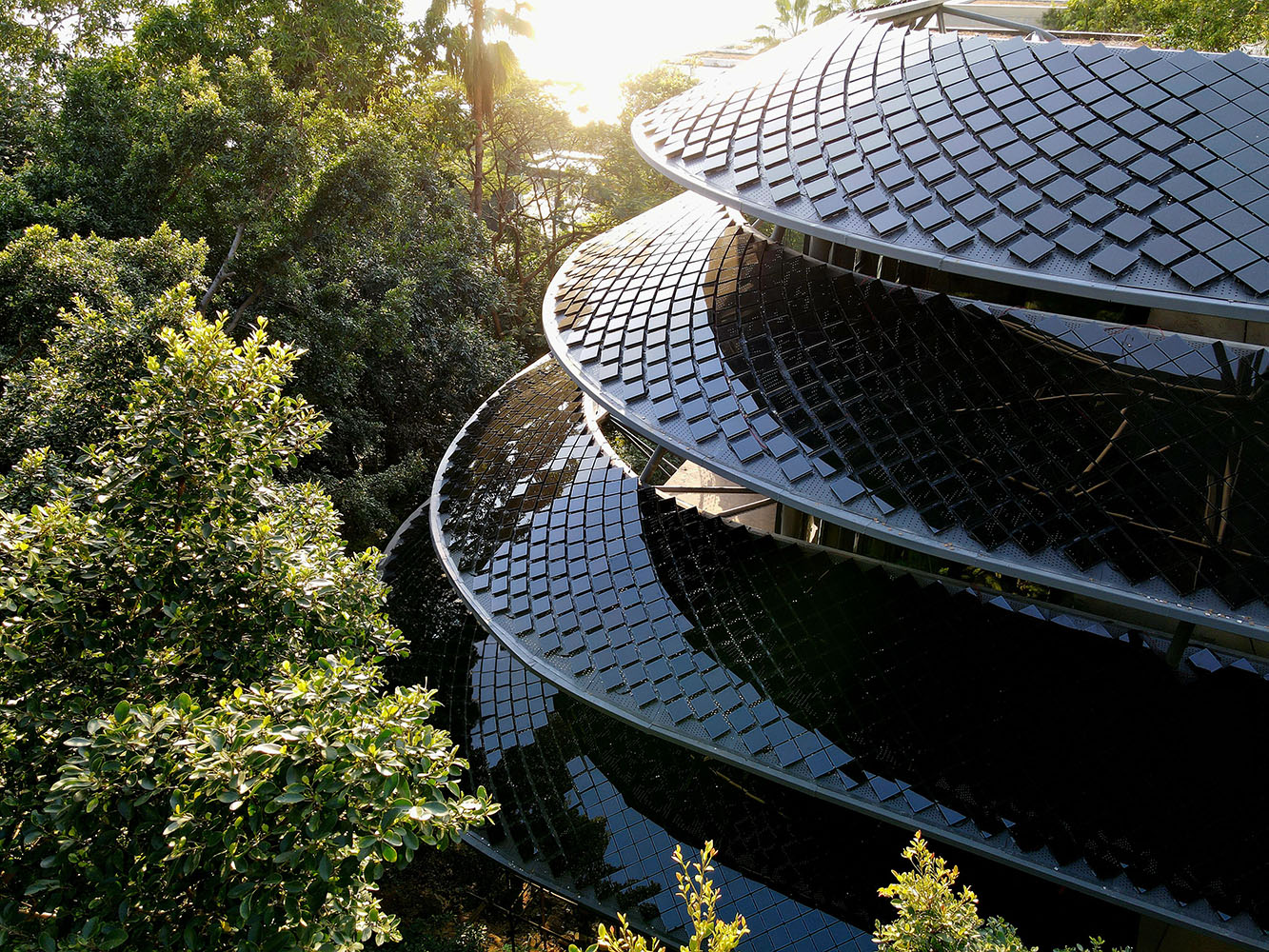 Positive Energy House Shenzhen exterior showing sweeping curved solar roofs integrated into architecture